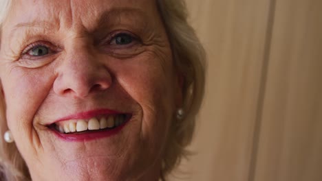 Senior-woman-in-social-distancing-smiling-at-camera