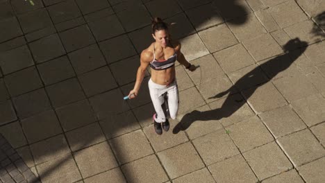 Sporty-Caucasian-woman-exercising-outdoor