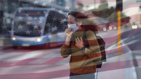 US-flag-waving-against-woman-wearing-face-mask-coughing