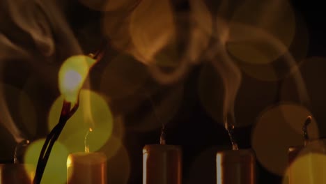 Animation-of-candles-being-blown-off-and-christmas-lights