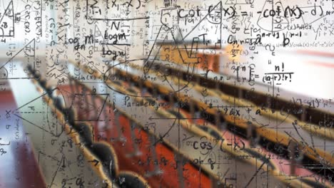 Digital-composition-of-mathematical-equations-and-formulas-floating-against-empty-classroom