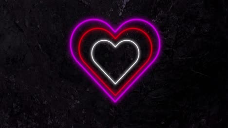 Animation-of-pink-red-and-white-concentric-neon-hearts-flashing-on-black-background