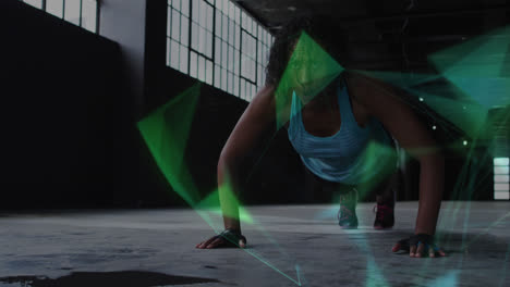 Animation-of-floating-colourful-shapes-over-woman-doing-push-ups-in-an-abandoned-building