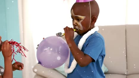 Animation-of-children-blowing-party-blowers-and-having-fun-at-party
