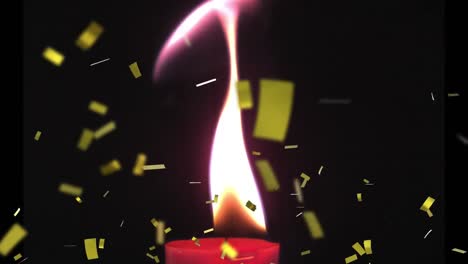 Animation-of-golden-confetti-falling-over-candle