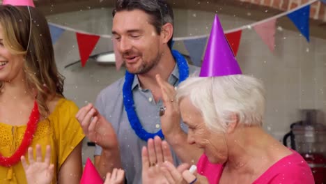 Animation-of-white-spots-over-family-having-fun-at-birthday-party