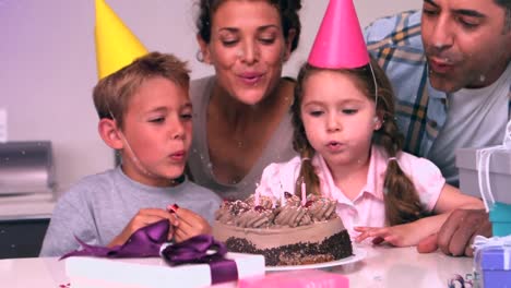 Animation-of-white-spots-over-family-having-fun-at-birthday-party