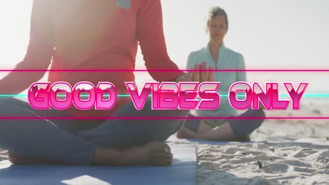 Animation-of-text-good-vibes-only,-in-shiny-pink,-with-happy-senior-women-meditating-on-beach