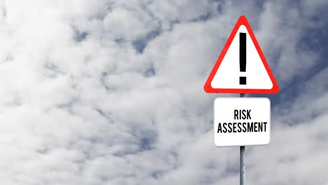 Attention-signboard-post-with-risk-assessment-text-against-clouds-in-the-blue-sky