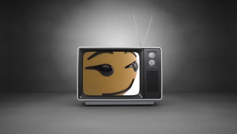 Animación-Digital-De-Emoji-De-Cara-Sonriente-En-La-Pantalla-De-Televisión-Contra-Fondo-Gris