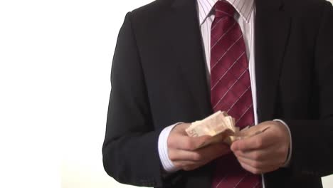 Stock-Footage-of-a-Man-Counting-Money