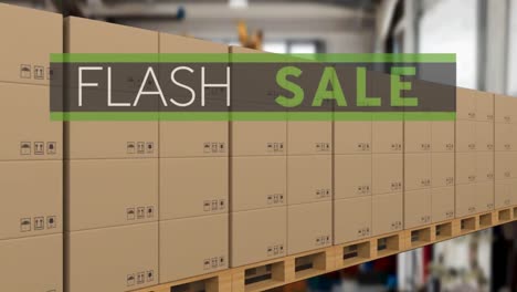 Animation-of-flash-sale-text-over-cardboard-boxes-on-conveyor-belt