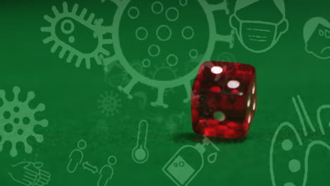 Animation-of-covid-19-cells-and-icons-over-two-dice-on-green-background