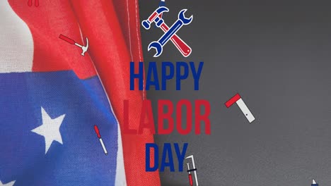 Animation-Des-Textes-„Happy-Labor-Day“-über-Werkzeugen-Und-Amerikanischer-Flagge