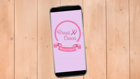 Animation-Des-Rosafarbenen-Brustkrebsband-Logos-Mit-Brustkrebstext-Auf-Dem-Smartphone-Bildschirm