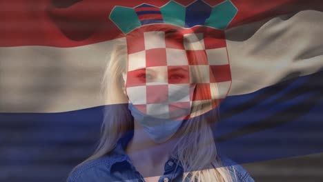 Animation-of-flag-of-croatia-over-woman-wearing-face-mask