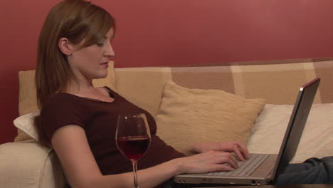 Stock-Footage-of-a-Woman-Relaxing-with-Computer