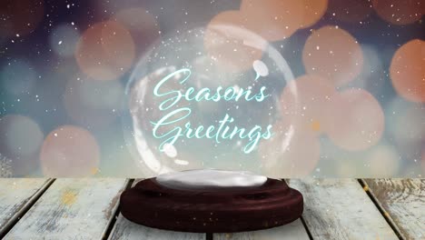 Golden-shooting-star-around-seasons-greetings-text-over-a-snow-globe-on-wooden-plank