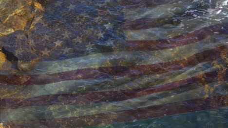 Digitale-Komposition-Der-Schwenkenden-US-Flagge-Gegen-Meereswellen,-Die-Auf-Die-Felsen-Schlagen