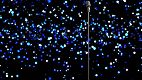 Animation-of-flying-glowing-blue-lights-over-microphone-on-dark-background