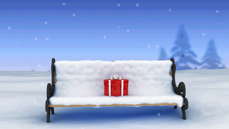 Animation-Von-Schnee,-Der-über-Ein-Weihnachtsgeschenk-Auf-Eine-Schneebedeckte-Bank-In-Einer-Winterlandschaft-Fällt