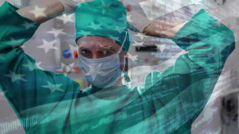 Animation-of-flag-of-usa-waving-over-female-surgeon-in-operating-theatre