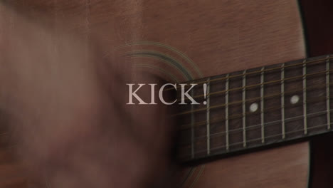 Animation-Von-Kick-Text-über-Einer-Person,-Die-Gitarre-Spielt
