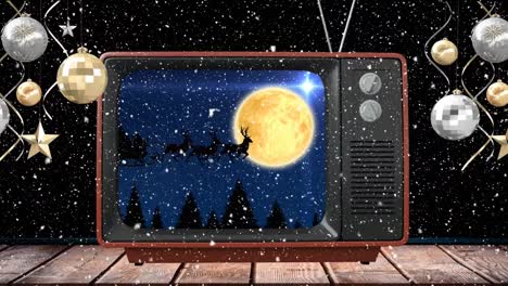 Animation-of-santa-claus-in-sleigh-with-reindeer-at-christmas-on-tv,-with-snow-falling-at-night