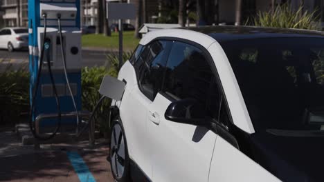 Electric-car-charging-at-electric-vehicle-charging-station