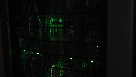 Green-control-lights-flashing-with-data-processing-on-computer-servers