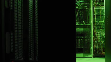 Close-up-of-green-control-lights-on-computer-servers-in-tech-room