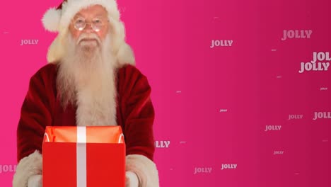 Animation-of-jolly-text-in-white,-with-smiling-santa-holding-christmas-present-on-pink-background