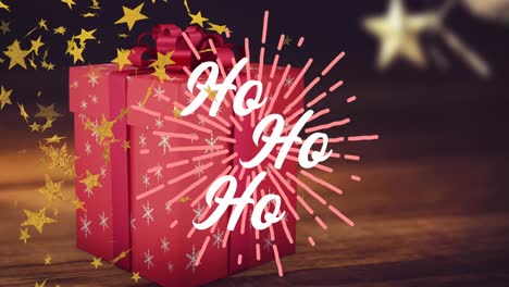 Animation-of-ho-ho-ho-text-in-white,-with-gold-stars,-over-christmas-present-and-decorations