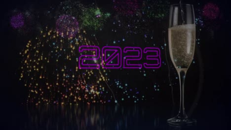 Animation-of-2023-text-over-glass-and-fireworks