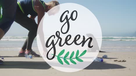 Animation-of-go-green-text-and-logo-over-two-caucasian-women-picking-up-rubbish-from-beach