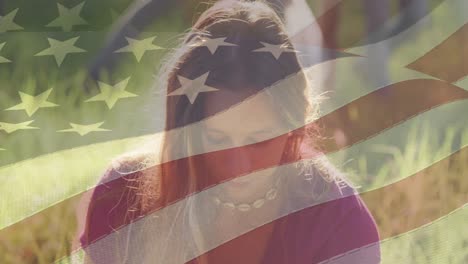 Vídeo-Compuesto-De-La-Bandera-Americana-Sobre-El-Retrato-De-Una-Voluntaria-Caucásica-Sonriendo-En-El-Bosque