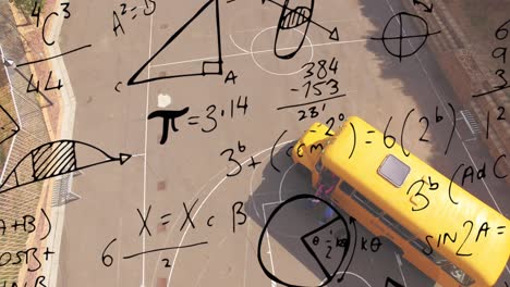 Mathematical-equations-against-aerial-view-of-school-kids-getting-into-the-school-bus