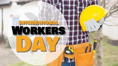 Animación-Del-Texto-Del-Día-Internacional-De-Los-Trabajadores-Sobre-Un-Trabajador-Caucásico-Con-Martillo-Y-Casco
