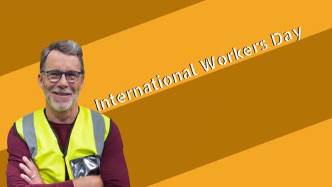 Animación-De-Un-Trabajador-Caucásico-Senior-Sonriente-Sobre-El-Texto-Del-Día-Internacional-De-Los-Trabajadores