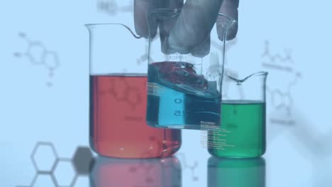 Animation-of-molecules-over-hand-in-safety-gloves-holding-chemical-reagent