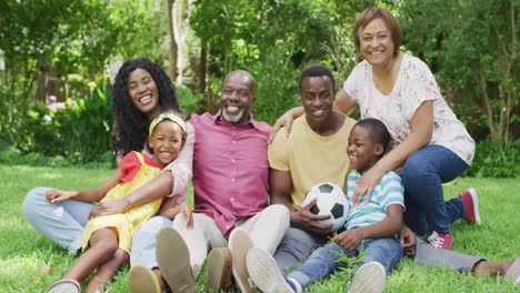 Animation-of-happy-african-american-family-having-fun-together-in-garden