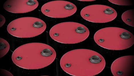 Video-of-multiple-red-barrels-on-black-background