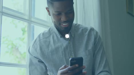 Animation-of-network-of-connections-and-globe-over-african-american-men-using-smartphone