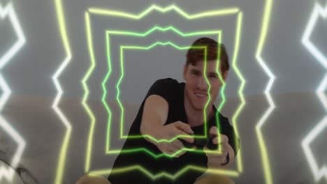 Animation-of-tunnel-with-neon-shapes-over-caucasian-man-playing-video-games