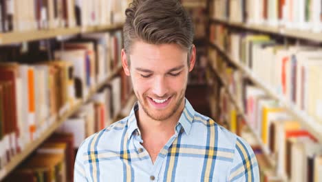 Animation-of-happy-caucasian-man-reading-book-over-library
