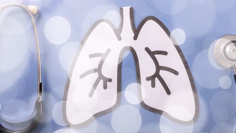Animation-of-spots-over-lungs-and-stethoscope