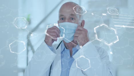 Animation-of-chemical-formula-over-caucasian-male-doctor-wearing-face-mask