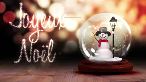 Animation-of-joyeux-noel-and-happy-new-year-text-over-snow-globe-and-light-spots