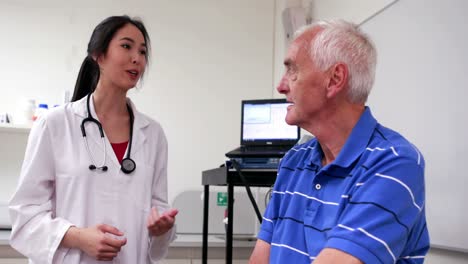 Doctor-talking-to-elderly-patient