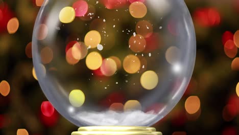 Animation-of-christmas-snow-globe-with-snow-falling-with-flickering-fairy-lights-in-background